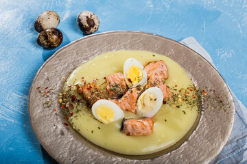 quail eggs with grilled salmon cubes over potato cream easter menu