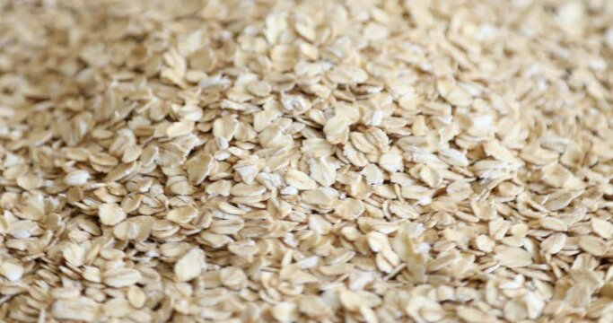 Top view of dry raw oat flakes