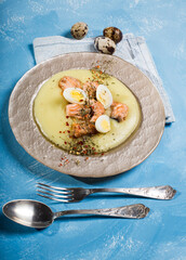 quail eggs with grilled salmon cubes over potato cream easter menu