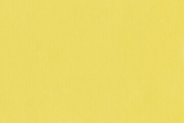 Clean yellow retro paper background. Vintage cardboard texture. Grunge paper for drawing. Simple blank fabric pattern.