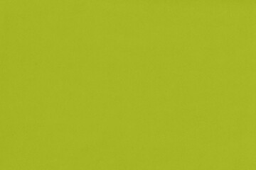 Clean yellow retro paper background. Vintage cardboard texture. Grunge paper for drawing. Simple blank fabric pattern.