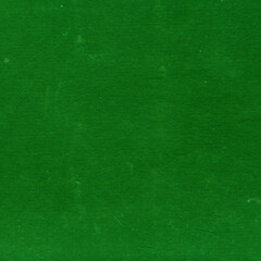 Fototapeta premium Cardboard green abstract pattern texture close-up. Retro old paper background. Grunge concrete wall. Vintage blank wallpaper.