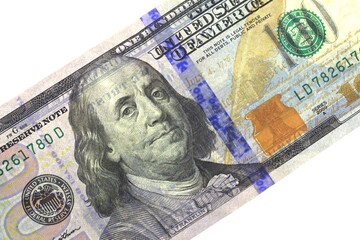 Obraz na płótnie Canvas Closeup of Benjamin Franklin's portrait on the One Hundred Bill
