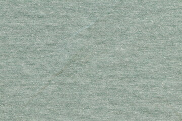 Green fabric texture for clothes.