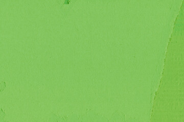 Cardboard green abstract pattern texture close-up. Retro old paper background. Grunge concrete wall. Vintage blank wallpaper.