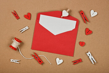 Red Valentine card envelope on brown paper