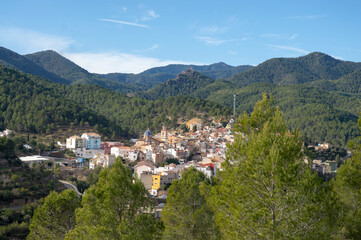 picture of a small town taken from the top of the mountains