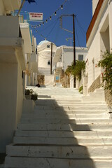 A typical alley in Adamas village,  Milos island (Greece). 