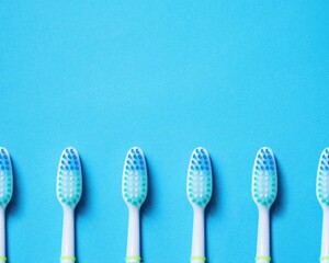 blue toothbrushes on blue background