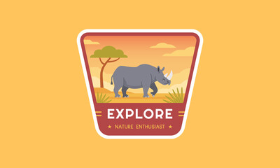 Outdoor wildlife adventure logo badge. Modern travel logo template best for emblem, patch, sticker, label, and many others. A rhinoceros living in a park flat vector illustration. © PurpleShine