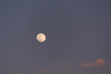 Full moon at sunset