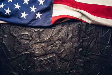 Flag of the United States on black or dark textured background