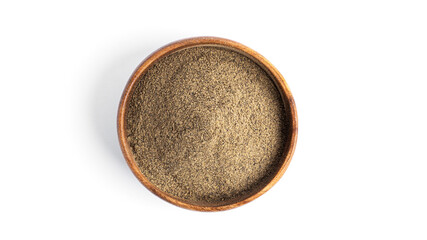 Milled black pepper in a wooden bowl isolated on a white background.