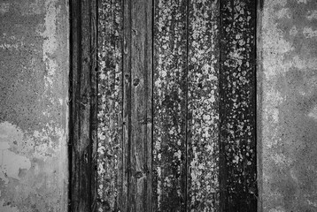 Background of old wooden planks and concrete wall. Monochrome empty space