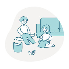 洗濯物を畳む夫婦