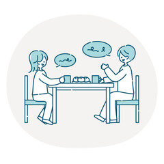 ダイニングテーブルで会話する夫婦