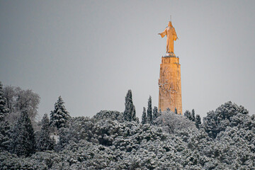 Cerro de los Ángeles in the municipality of Getafe after a heavy snowfall, sculpture del Cristo