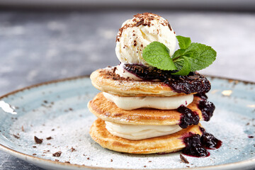 pancakes with ice cream and berries