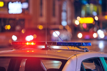 Police car lights at night city street
