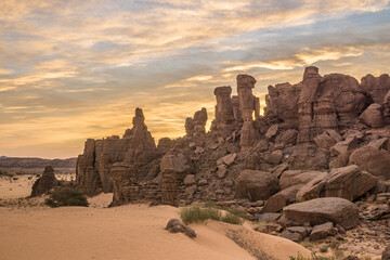 Sandstone pinnacles in the Sahara desert at sunset, Chad, Africa