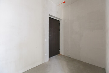 interior of the apartment without decoration in gray colors