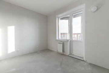 interior of the apartment without decoration in gray colors
