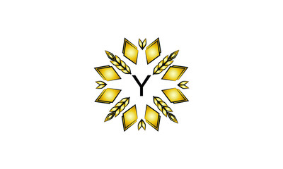 Decorative golden logo with geometric shapes and spikelets on a white background. Creative vector sign, illustration of emblem with letter Y. Eco emblem.