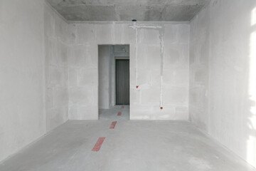 interior of the apartment without decoration in gray colors