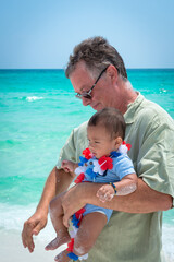 Legacy: father and son on the beach