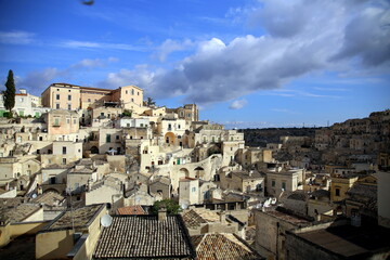 Fototapeta na wymiar Panoramic view, under a blue sky, of the Sassi of Matera, European Capital of Culture 2019