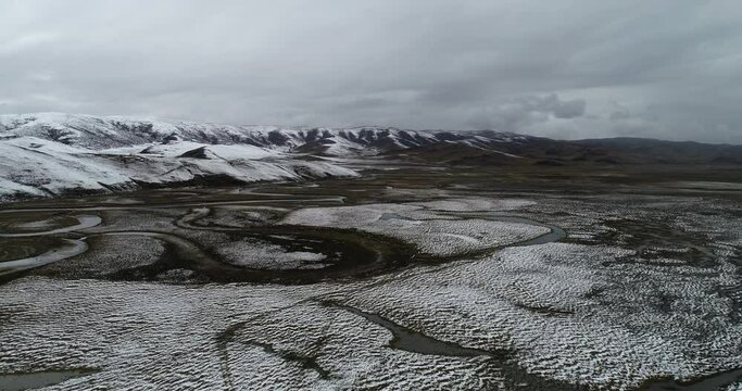 Aerial photography of the natural scenery of the wetland after the snow. Zoige, Ngawa Tibetan and Qiang Autonomous Prefecture, Sichuan, China