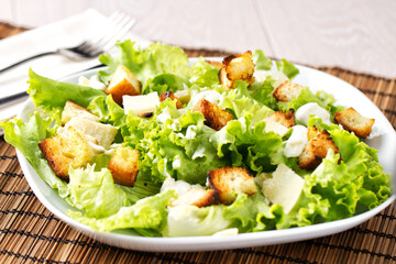 Classic Chicken Caesar Salad on a plate.