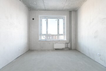 interior of the apartment without decoration in gray colors