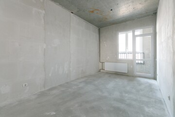 interior of the apartment without decoration in gray colors