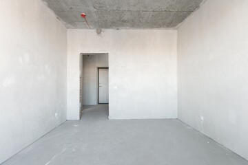interior of the apartment without decoration in gray colors