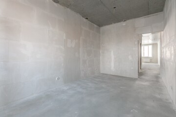 interior of the apartment without decoration in gray colors