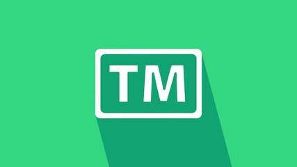 White Trademark icon isolated on green background. Abbreviation of TM. 4K Video motion graphic animation. - Powered by Adobe