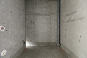 interior of the apartment without decoration in gray colors