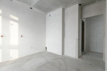 interior of the apartment without decoration in gray colors