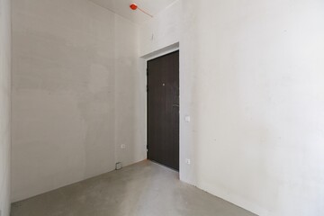 interior of the apartment without decoration in gray colors