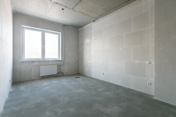 interior of the apartment without decoration in gray colors