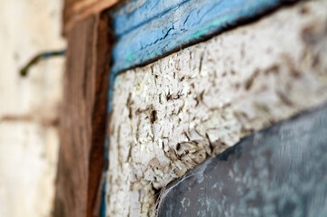 Cracked paint on wooden window