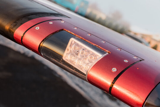 Front light on an airplane wing, close-up view of light.