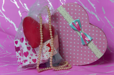 Valentine day composition: white gift boxes with bow and red hearts,Top View. and several different boxes and red heart