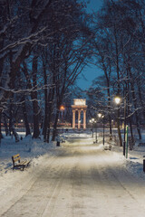 Fototapeta na wymiar Park Strzelecki in Tarnow Poland at Winter Day. Morning after Snowfall