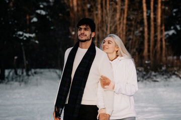 couple walking in the snow