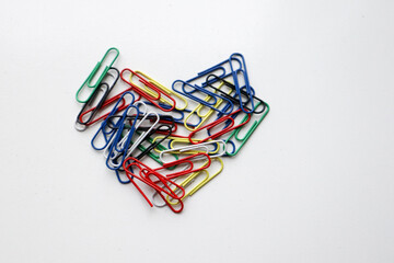 heart shaped colorful paper clips on white background Saint Valentine's Day