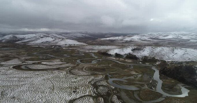 Aerial photography of the natural scenery of the wetland after the snow. Zoige, Ngawa Tibetan and Qiang Autonomous Prefecture, Sichuan, China