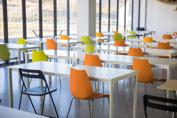 Interior of restaurant or cafe with tables and chair