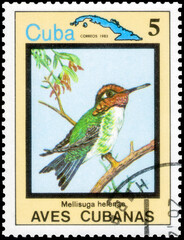 Postage stamp issued in the Cuba with the image of the Bee Hummingbird, Mellisuga helenae. From the...